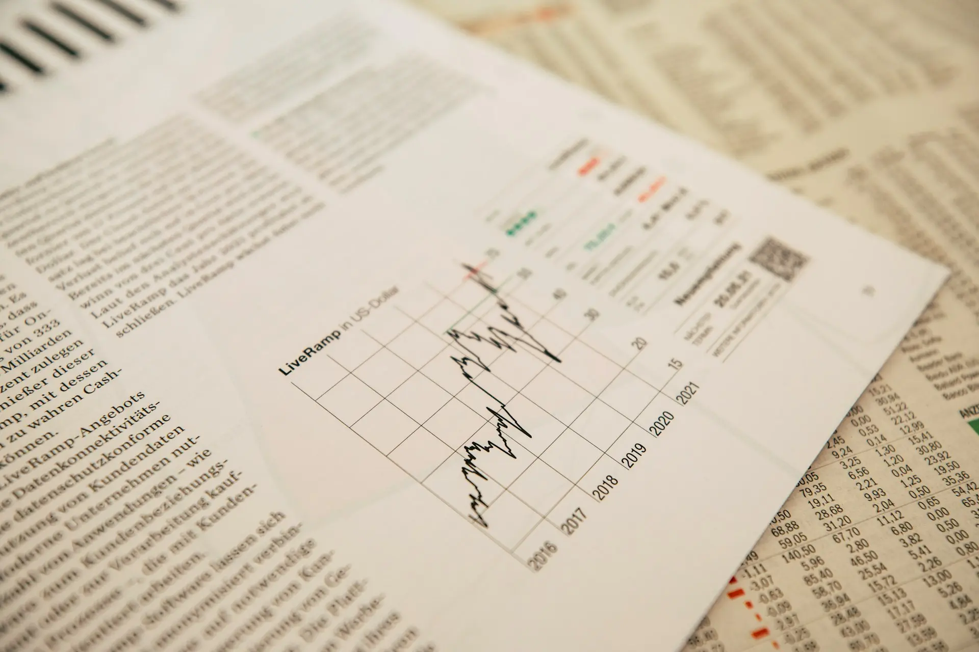 a printed report showing a graph sitting on a table